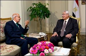 Mohamed Elbaradei, left, meeting with interim president Adly Mansour, right, at the presidential palace.