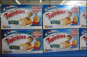 Hostess Twinkies made their officially return to the grocery shelves in Toledo, Ohio on Monday.