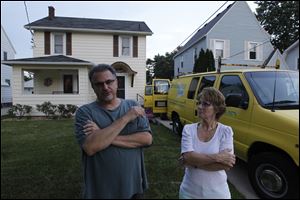 Jim and Karen Nassar complain about their flooded basement.