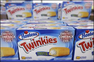 Boxes of Twinkies line a shelf in Wal-Mart in Bristol, Pa. Friday.