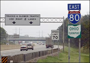 Under state law, Ohio Turnpike tolls would remain frozen at current levels for commuters using E-Z Pass and traveling less than 30 miles between exits.