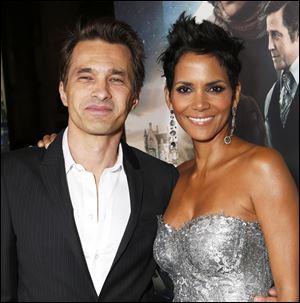 Actors Olivier Martinez and Halle Berry, photographed in October at the Los Angeles premiere of Berry's film  'Cloud Atlas,' were married in a weekend ceremony in a church near a chateau in France's Burgundy region.