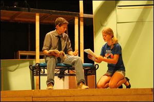 From left, Keith Dona of Sylvania, portraying Tevye, and Anna Birkmeier of Waterville, as Tzeitel, rehearse a scene from 'Fiddler on the Roof.'