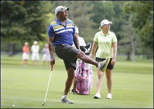 Former Toledo quarterback Chuck Ealey and Brittany Lincicome won Tuesday’s pro-am with a 3-under in the event's six holes.