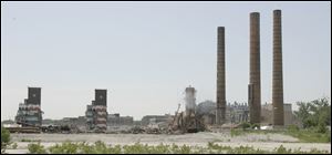 Three smokestacks remain standing as demolition of the old Toledo Jeep Assembly plant continues.