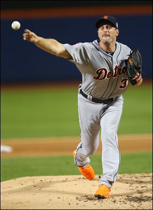 American League’s Max Scherzer, of the Detroit Tigers, pitches during the first inning.
