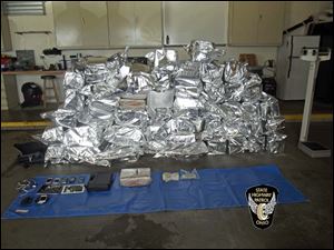 The drugs, weighing 907 pounds and worth $4,117,780, according to the Highway Patrol.