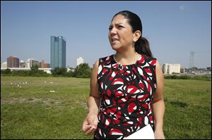 Lucas County Auditor Anita Lopez, a candidate for mayor of Toledo, announces her economic development plan during a news conference in the Marina District.