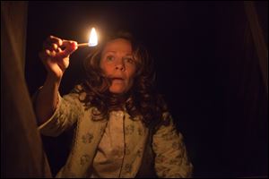 LilI Taylor portrays Carolyn Perron in a scene from 'The Conjuring.'