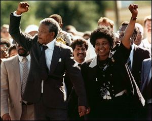 Nelson Mandela went free on Feb. 11, 1990, after  27 years as a political prisoner in South Africa. He then negotiated with the nation’s apartheid oppressors to launch the country's first democratic elections in 1994. At right is his wife Winnie. The couple separated in 1992 and divorced in 1996.