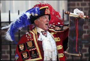 Tony Appleton, a town crier, announces the birth of the as-yet publicly unnamed baby outside St. Mary's Hospital's exclusive Lindo Wing in London.