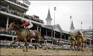 Joel Rosario rides Orb during the 139th Kentucky Derby at Churchill Downs Saturday, May 4, in Louisville, Ky. 