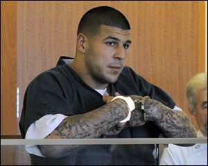 Aaron Hernandez stands during a bail hearing in Fall River Superior Court last month in Fall River, Mass. 