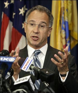 U.S. Attorney Paul Fishman says the group is connected with stealing and selling at least 160 million credit and debit card numbers, resulting in losses of hundreds of millions of dollars. Princeton-based Heartland Payment Systems Inc., which processes credit and debit cards for small to mid-sized businesses, was identified as taking the biggest hit in a scheme starting in 2007.