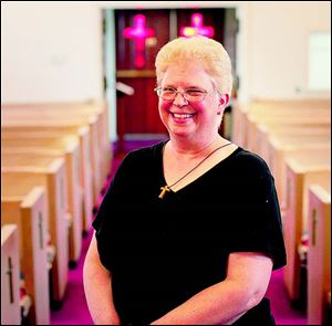Pastor Beth Huener in the church.