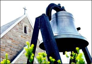 The bell outside First St. Mark’s Lutheran Church.