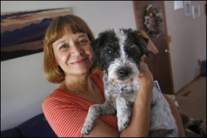 Linda Pittman and her eight-year-old Fell terrier Molly was diagnosed with leptospirosis, a bacterial infection that can cause flulike symptoms and affects the liver and kidneys. Ms. Pittman’s other two dogs have not tested positive for the illness.