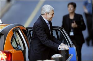 Former Penn State president Graham Spanier enters the Dauphin County Courthouse, today in Harrisburg, Pa. 