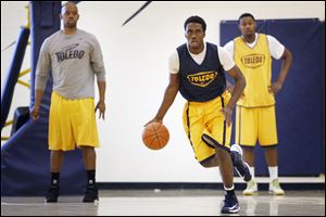 Junior forward Justin Drummond goes through a drill at practice. Drummond, who sat out last season, and his teammates will play four games during an 11-day trip to Greece next week.