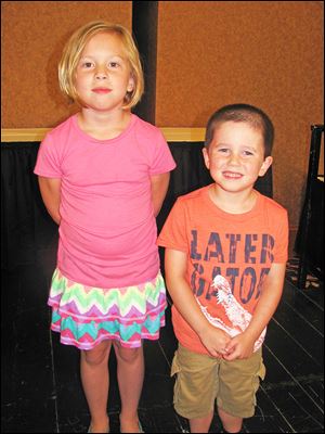 Gabbey, 7 and Gannon, 5 children of staffer Heather Warga, volunteered at the party buy handing out the raffle prizes. Gannon was a real ham and loved using the microphone. Gabbey was the youngest volunteer at the tournament as a runner. 