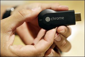 Google’s new Chromecast, priced at only $35, adds the Internet to TVs at home via wireless networks.