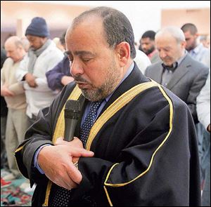 Imam Farooq Abo Elzahab leads a prayer services at the Islamic Center of Greater Toledo.