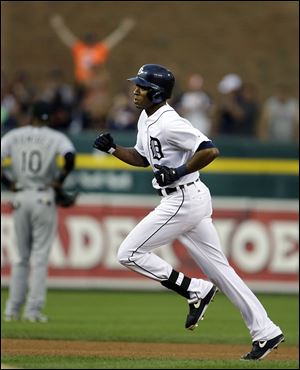 The Tigers' Austin Jackson rounds second base after his solo home run during the fifth inning against the White Sox.