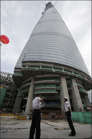 The Shanghai Tower is set to become the tallest building in China which is planned to be complete in 2014.