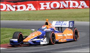 Charlie Kimball takes a corner during his Honda Indy 200 victory at Mid-Ohio Sports Car Course in Lexington, Ohio.