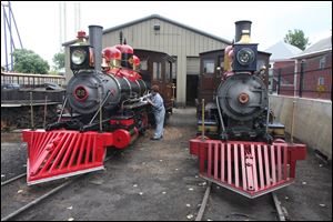 Locomotives Myron H., left, and Judy K. carry most of the Cedar Point railroad’s work load.