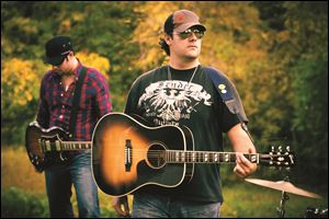 The Aaron Stark band performs at Hollywood Casino's H Lounge Friday.