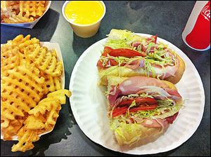 The Spots Special (an Italian sub) with waffle fries at Mister Spots in Bowling Green.