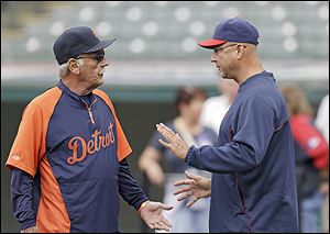 Tigers manager Jim Leyland, left, talks with Indians manager Terry Francona. Detroit leads the AL Central by five games.