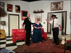Wes Taylor, Samantha Henry, and Bob Huber in a scene from the Fort Findlay Playhouse production of Neil Simon's 'Rumors.'    