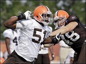 Browns linebacker Barkevious Mingo, left, has impressed his teammates in camp.