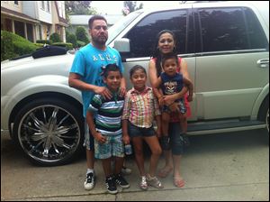 From left: Juan Manchaca,  Juan J. Manchaca, 9, Isabel Velez, 7, and Elly Georgina Velez-Montes, holding Christian Manchaca, 23 months. Ms. Velez-Montes was almost deported again. They live in Painesville, Ohio.
