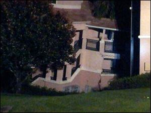 A building at the Summer Bay Resort in Clermont, Fla, shows damage from collapsing into a sinkhole early Monday Aug. 12, 2013.  No injuries or victims and all emergency responders were safe and uninjured. All guests that were rescued are being moved to a different building on the property.