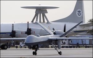 A Predator B unmanned aircraft taxis at the Naval Air Station in Corpus Christi, Texas. The growing reliance on drones in Yemen suggests the limit of resources the United States can employ in combating the new threats.
