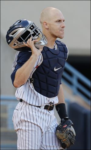 Catcher Brad Davis says he will return to classes at Long beach State, where he will serve as a volunteer assistant coach.