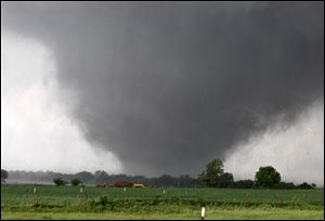 A tornado passes across south Oklahoma City, Monday, May 20.