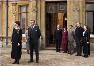 From left, Elizabeth McGovern as Lady Grantham, Hugh Bonneville as Lord Grantham, Dan Stevens as Matthew Crawley, Penelope Wilton as Isobel Crawley, Allen Leech as Tom Branson, Jim Carter as Mr. Carson, and Phyllis Logan as Mrs. Hughes, from the TV series, 'Downton Abbey.'