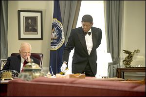 Robin Williams, left, in a scene with Forest Whitaker in Lee Daniels' 'The Butler.'