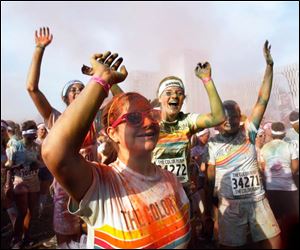 Color Run participants are all smiles during the race.