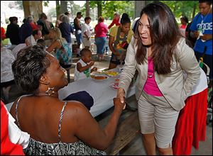 Iris Smith, left, talks with mayoral candidate Anita Lopez during a Block Watch event at Ottawa Park.