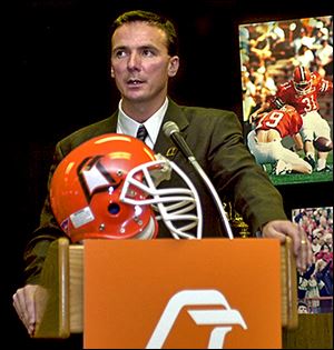 Urban Meyer is introduced as Bowling Green coach Dec. 4, 2000. Meyer left after two seasons to coach at Utah.