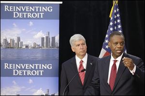 In July, Kevyn Orr, state-appointed emergency manager, right, with Michigan Gov. Rick Snyder, asked for bankruptcy protection. Unions, creditors, and retirees were expected to file formal objections to Detroit’s eligibility before today’s deadline.