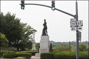 A proposal to renovate Perrysburg's riverfront includes moving the statue of Commodore Perry down the slope between Front Street and the Maumee River to offer a better view of the river.