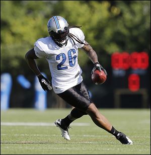 The Lions’ Louis Delmas is back and trying to move a step closer to playing an important role for a team that needs the banged-up leader to stay healthy.