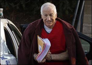 Former Penn State assistant football coach Jerry Sandusky arrives at the Centre County Courthouse for a post-sentencing hearing in Bellefonte, Pa., in January.