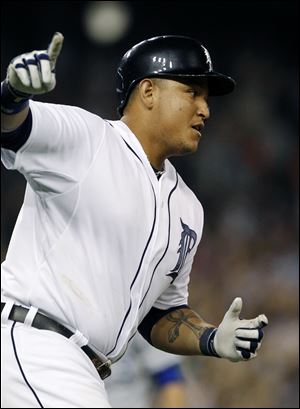 Detroit Tigers' Miguel Cabrera rounds the bases after hitting a walk-off home run that beat the Kansas City Royals Saturday night.